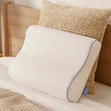 Contour memory foam pillow with white cover and blue trim, side view