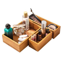 Bamboo storage organizer with nested open compartments for bottles and tools