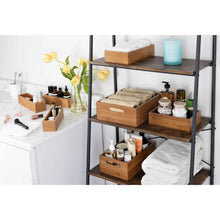Bamboo organizer starter set bins for a bathroom shelf with towels and toiletries