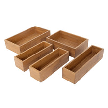 Empty bamboo organizer trays set with multiple divided compartments
