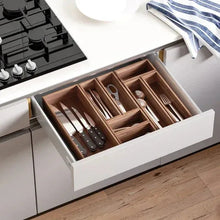 White drawer with acacia utensil organizer insert and slots for forks and knives