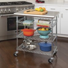 Stainless steel kitchen cart with three wire shelves, side basket, worktop and locking wheels