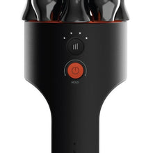 Handheld massager handle with power and mode buttons on dark body