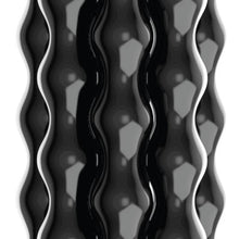 Rolling massage head with wavy black rollers and reflective texture