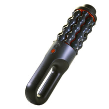 Handheld rolling massager with black roller head and red control accents