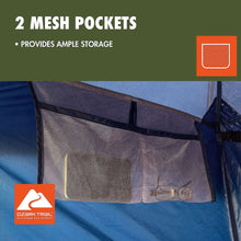 Blue privacy shelter tent with two mesh storage pockets on interior wall