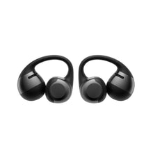 Pair of open-ear earbuds in dark gray, front view