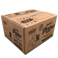 Cardboard shrimp chips shipping box with Happy Shrimp Chips print and icons