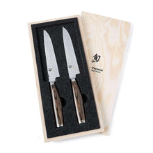 Two steak knives in wooden presentation box with stainless steel blades
