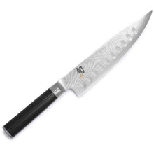 Chef’s knife with black handle and silver patterned hollow-edge blade, 8 in