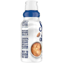 Almond creamer bottle with blue band and almond and vanilla flavor callouts