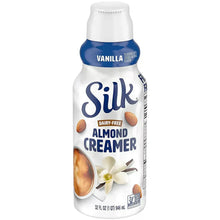 Almond creamer bottle with blue band and Vanilla Almond Creamer label