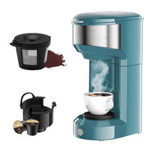 Teal single-serve coffee maker with steel brewing chamber and cup platform