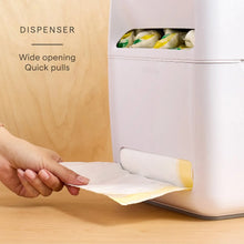 White under-sink dish pod organizer with bottom bag compartment being pulled out