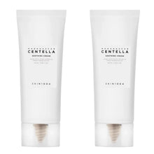 Two white Centella soothing facial cream tubes