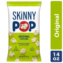 SkinnyPop Original popcorn bag, 14 oz, with red logo and scattered popcorn
