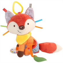 Red fox plush stroller toy with yellow scarf, striped body, green teether leaf