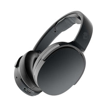 Black over-ear wireless Bluetooth headphones with cushioned ear cups