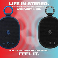 Skullcandy mini wireless speaker pair with textured grilles and carry rings, black
