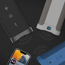 Rugged wireless speaker with fabric mesh grille, visible LED indicator and control buttons.