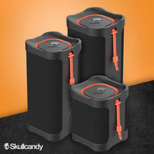 Set of rugged wireless speakers, black with orange accents and textured fabric grille
