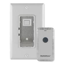 White wall light switch with snap-on remote, open panel and push-button.