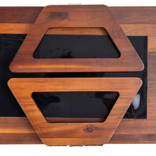 Wood armrest tray with recessed black tabletop insert and front supporting stand