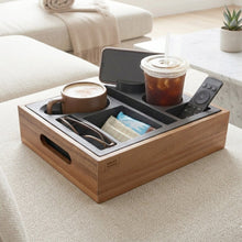 Acacia wood couch console with divided organizer insert, cup holders, and phone and remote slots