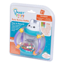 Busy bunny rattle in blister pack with blue torso, purple loops, and multicolor beads