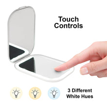 LED double-sided compact mirror with touch control on base, finger reaching