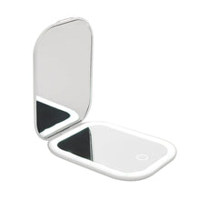 LED double-sided compact mirror with open lid and glowing light strip