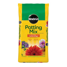 Miracle-Gro potting mix bag with green top and yellow sides, front view