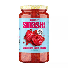 Raspberry superfood fruit spread jar with lid and front label, red spread and raspberries