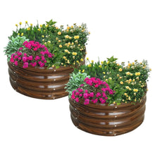 Raised garden bed set with brown metal sides and blooming flowers on top
