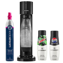 Sparkling water maker bundle with black machine, pink bottle, and two mix cans