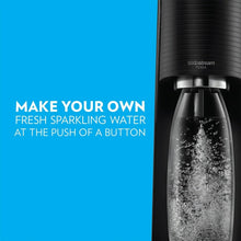 SodaStream Terra sparkling water maker dispensing fizzy water into a bottle