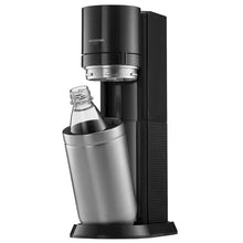 Sparkling water maker with stainless steel carafe and glass bottle on base
