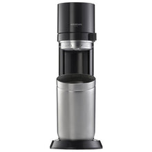 Sparkling water maker with black head and stainless steel carafe on stand