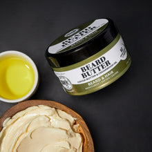 Beard butter balm jar with creamy yellow balm in bowl and on wooden spoon