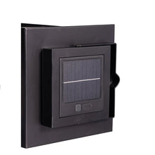 Solar LED lantern control module with dark screen and small button icons.