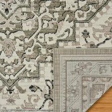 Sage and cream runner rug close-up of textured medallion motifs