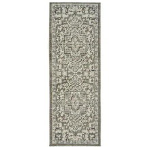 Sage and gray runner rug with detailed central medallion and border