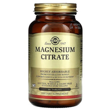 Magnesium citrate tablets supplement bottle with golden lid and front label