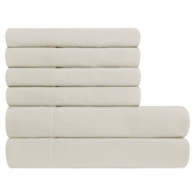 Microfiber sheet set with solid light beige folded stack of sheets