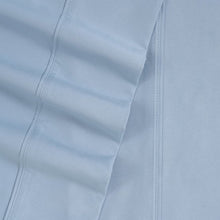Light blue microfiber sheet corner with stitched seam detail