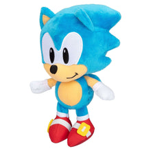 Blue Sonic plush toy with yellow belly and white gloves, red shoes and stripes
