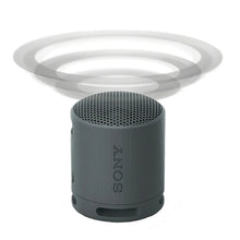 Dark gray portable Bluetooth speaker with top mesh grille and compact cylindrical shape