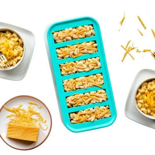 Turquoise silicone freezer tray with narrow compartments, filled with food