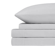 Solid white microfiber sheet set folded with stitched edges and two pillowcases