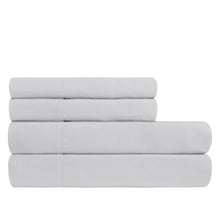 Solid white microfiber sheet set folded stack with visible stitching lines